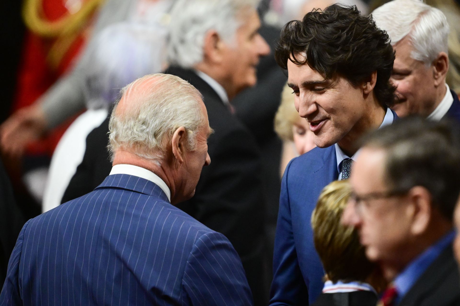 King Charles III speaks with Former Prime Minister of Canada Justin Trudeau ahead of the opening first session of the 45th Parliament of Canada at the Senate of Canada on May 27, 2025  (Image via Getty)